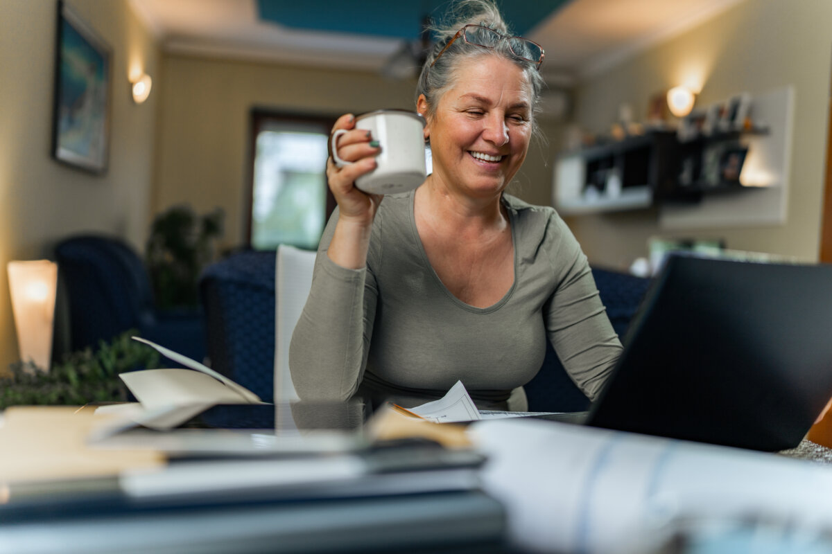 Middle-aged adult on laptop