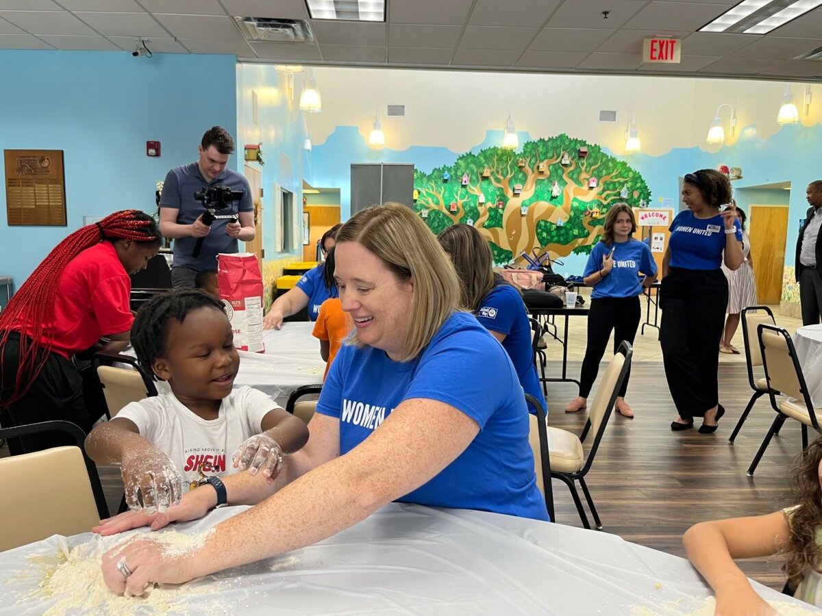 Women United member volunteering at Orlando Day Nursery
