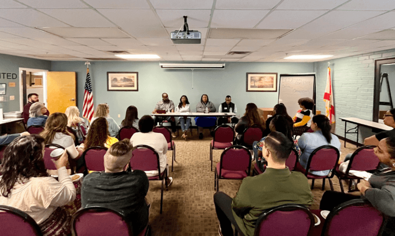 Photo of panelists and listeners from Black History Month Coffee & Conversation