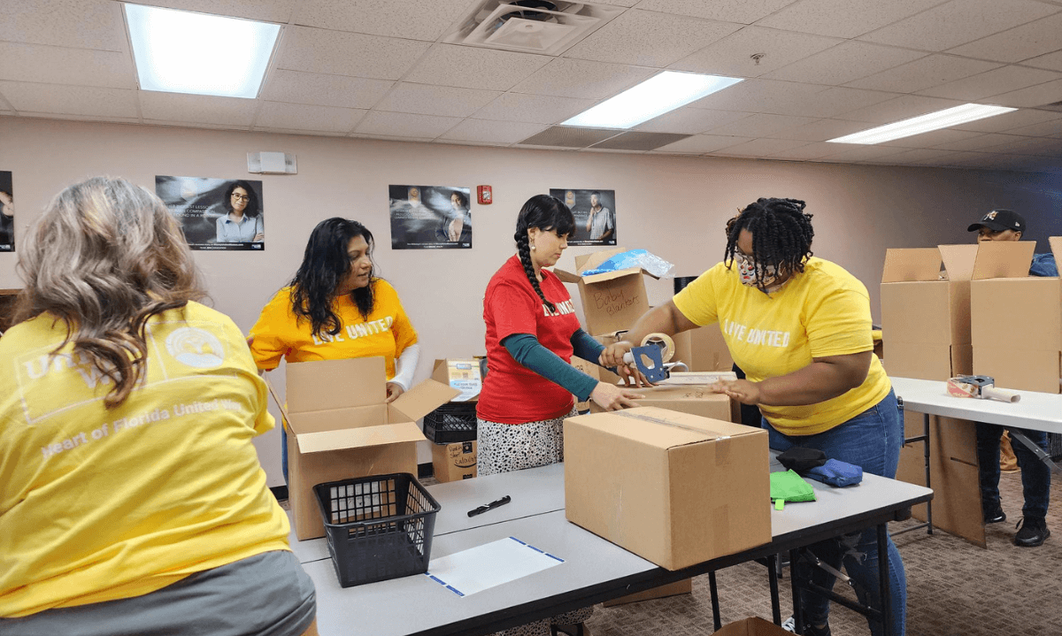 Volunteers packing kits