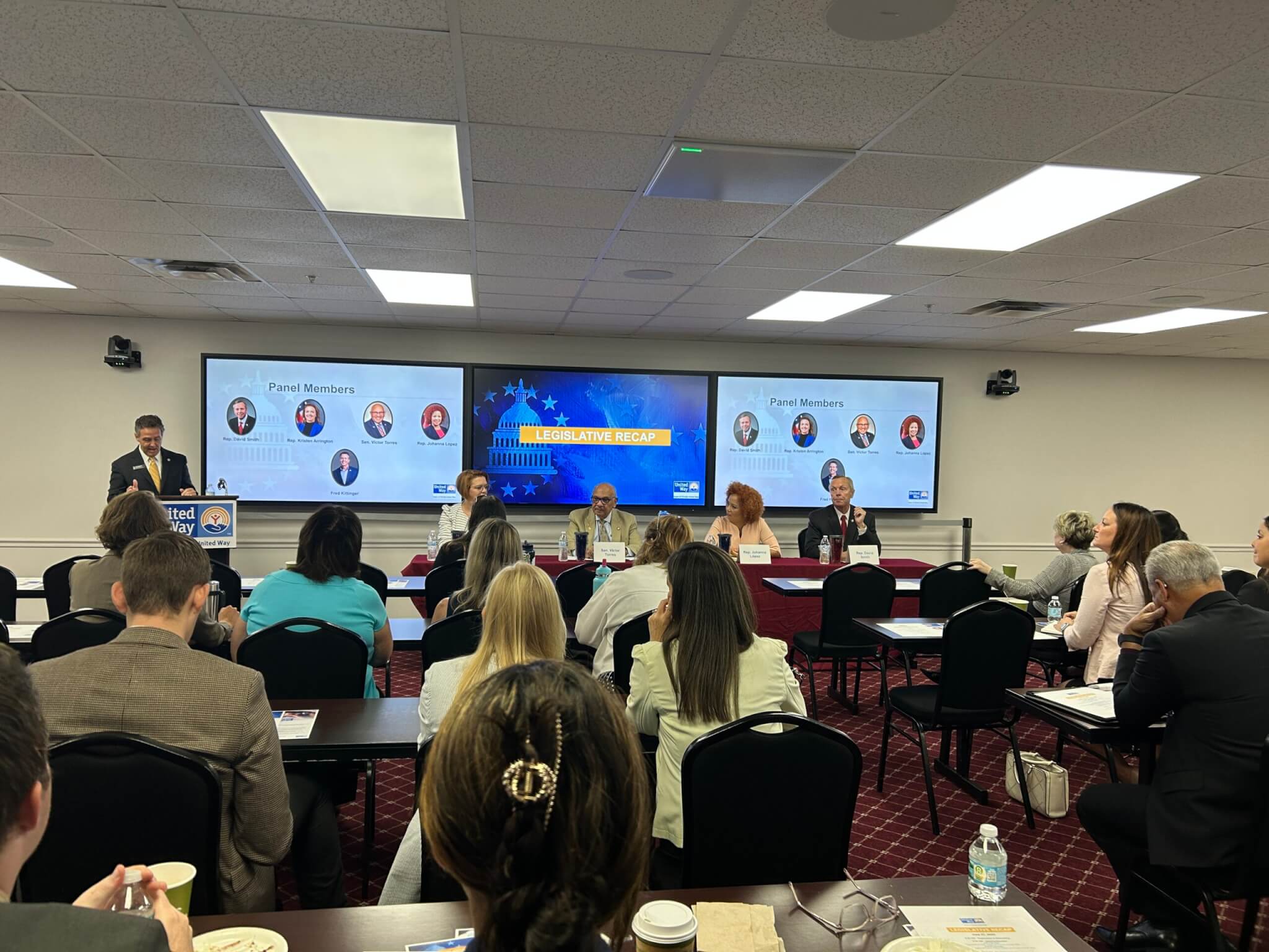 Audience listening to panelists at Legislative Recap