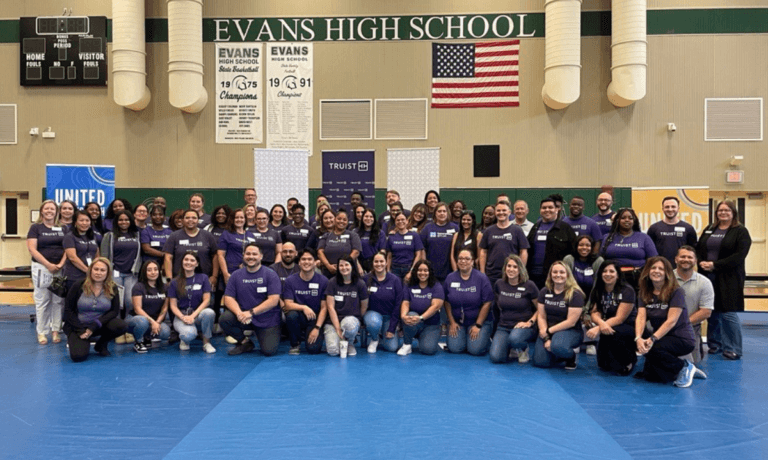 Truist Volunteers at Evans High School for HFUW's Reality Store
